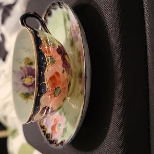 Handpainted Teacup & Saucer